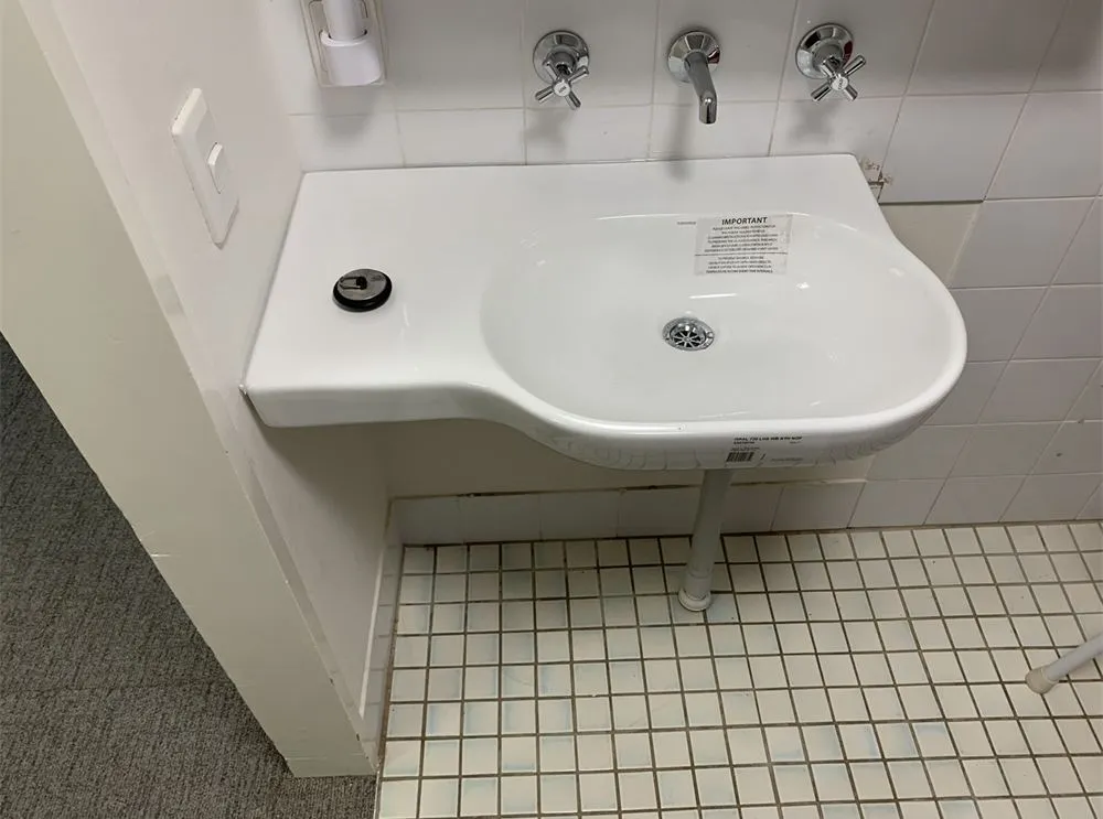 Hand basin installed in a tiled amenities block